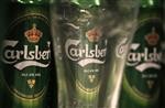 Chute du b�n�fice trimestriel de Carlsberg, objectif abaiss�