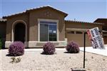 Home resales at 1-1/2 year-high, supply falls