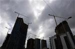 La croissance am�ricaine moins rapide qu'estim� au 4e trimestre